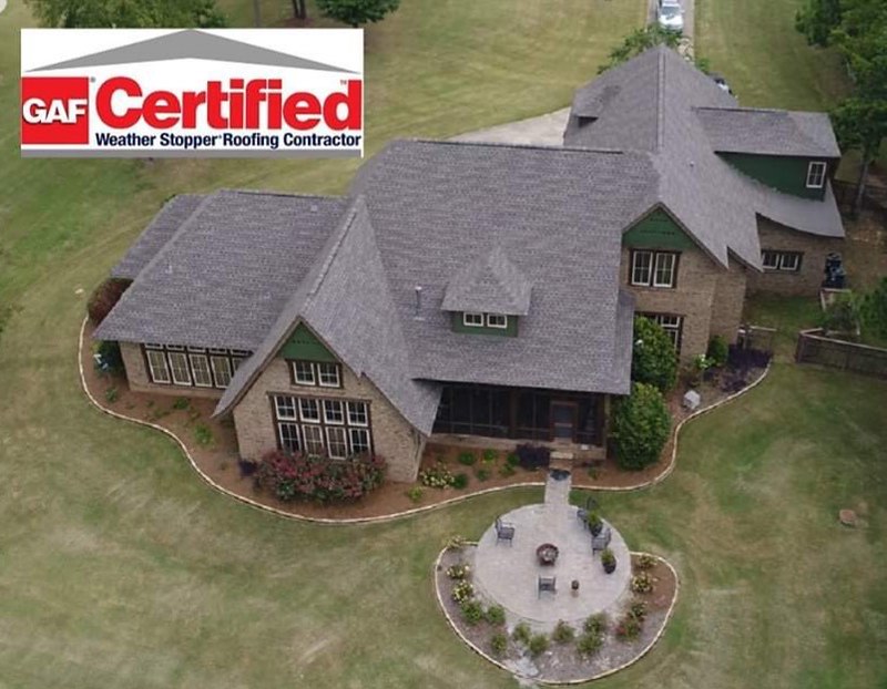aerial view of home with asphalt shingles