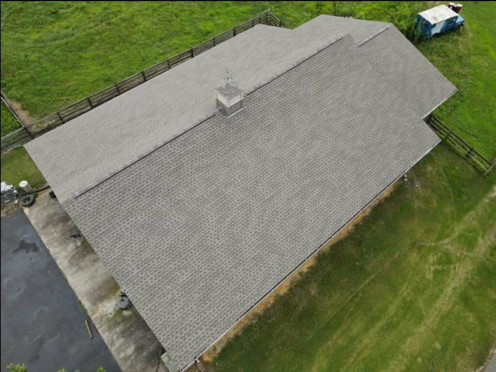 aerial view of building with asphalt roof shingles